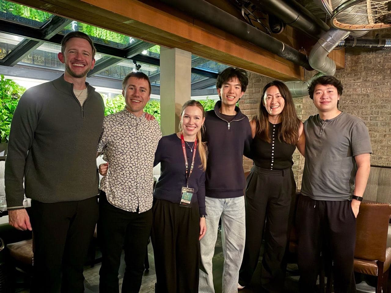 The Factory team and Research Corner members gathered for a group photo after dinner